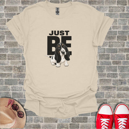 T-shirt with "JUST BE" text and a Basset Hound illustration.