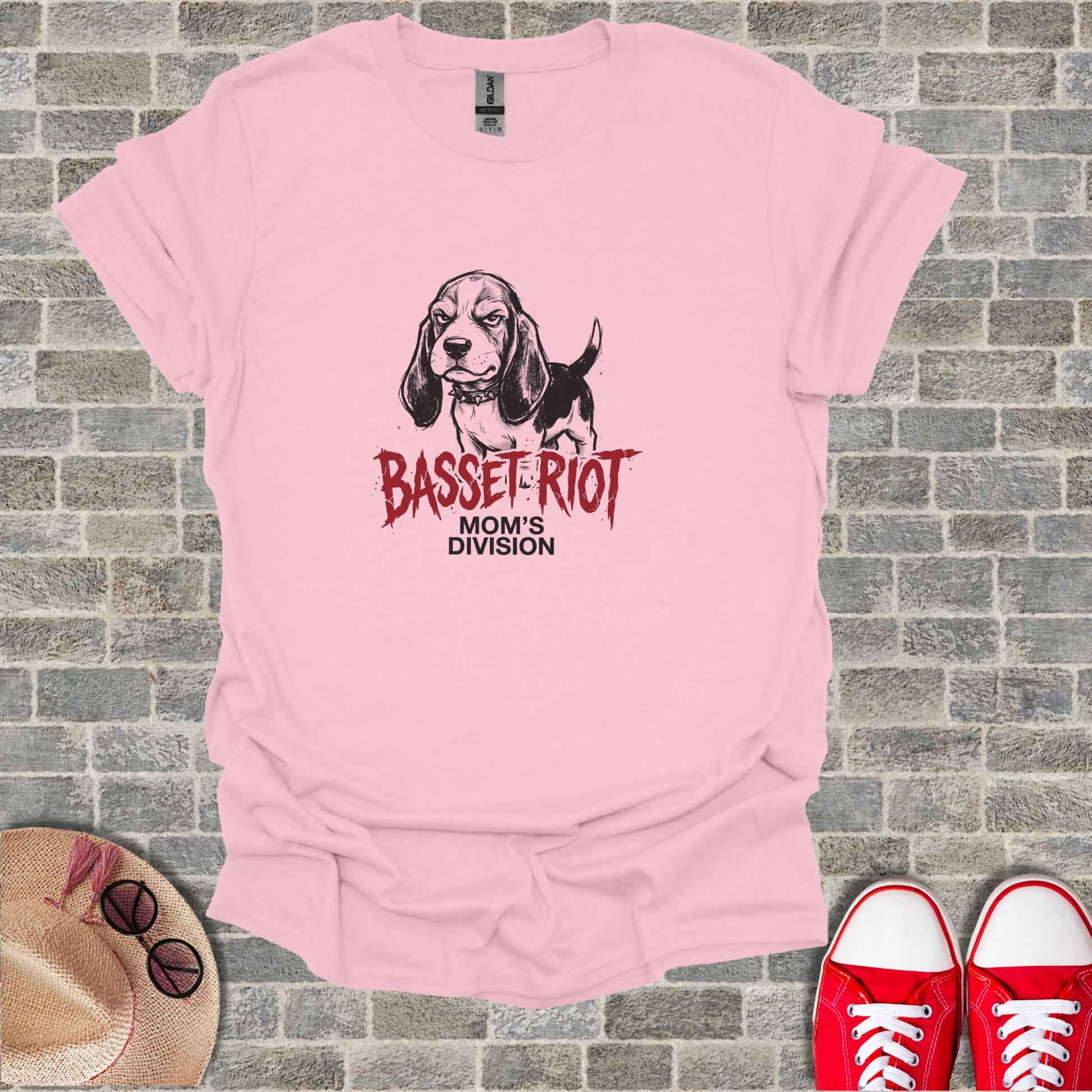 Pink t-shirt with "BASSET RIOT MOM'S DIVISION" text and a basset hound illustration.