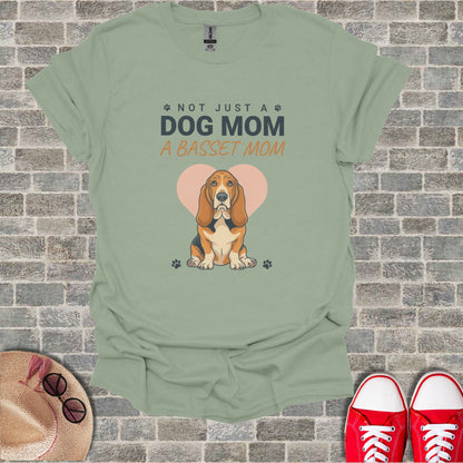 Green t-shirt with "Not Just a Dog Mom, a Basset Mom" and a Basset Hound.