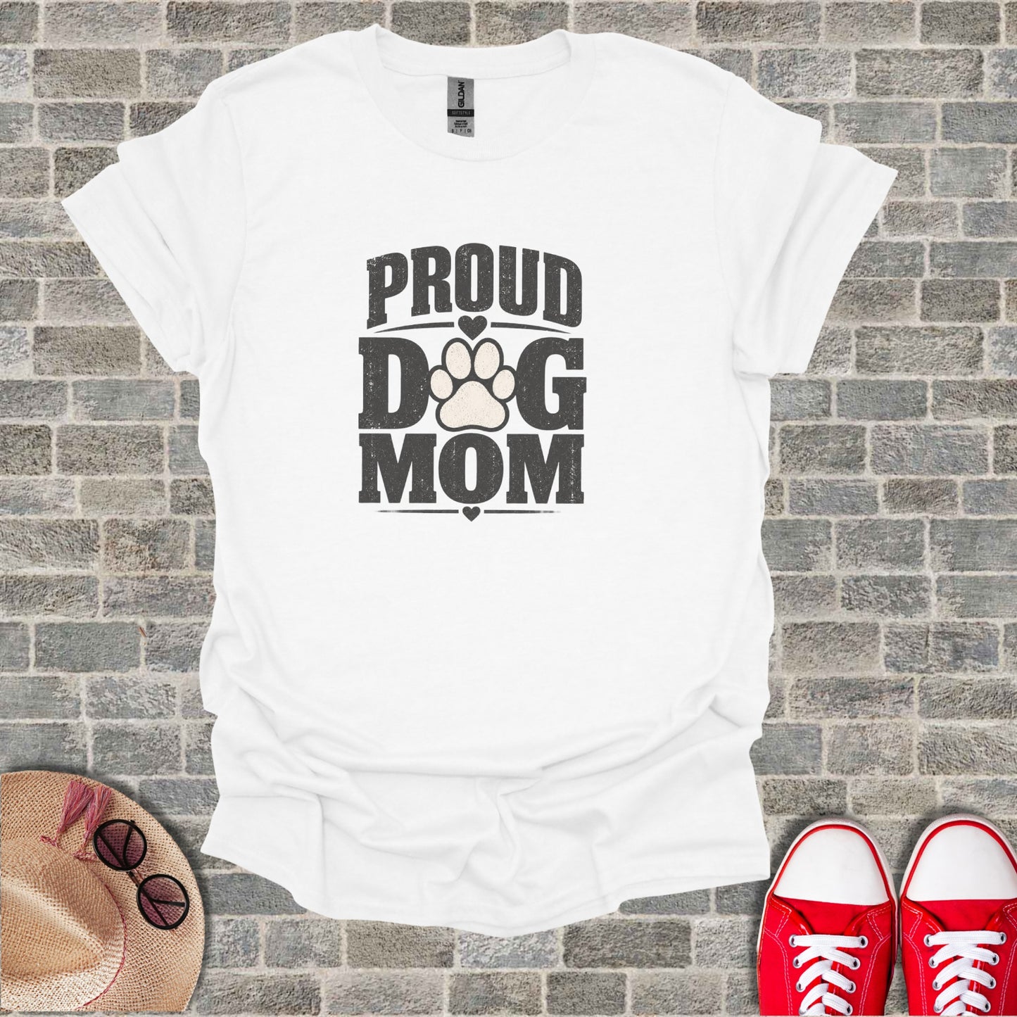 White t-shirt with "Proud Dog Mom" text and paw print design.
