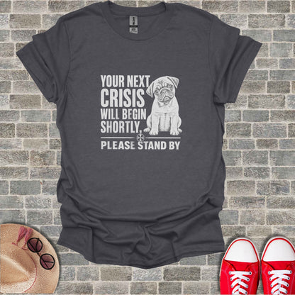 T-shirt with pug and text "Your next crisis will begin shortly. Please stand by."
