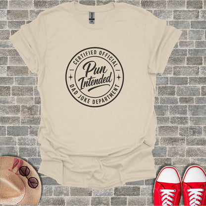Cream t-shirt with "Certified Official Pun Joke Department" graphic.