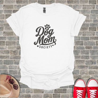 White t-shirt with "Dog Mom Society" text and dog paw icon.