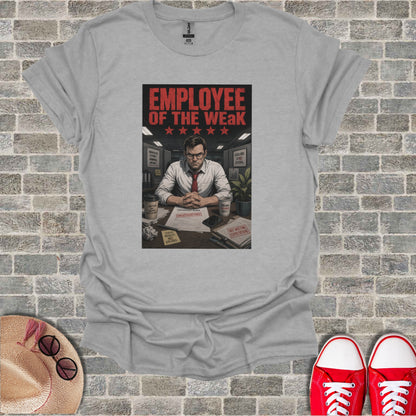 T-shirt graphic: "Employee of the Weak" with office scene and motivational phrases.