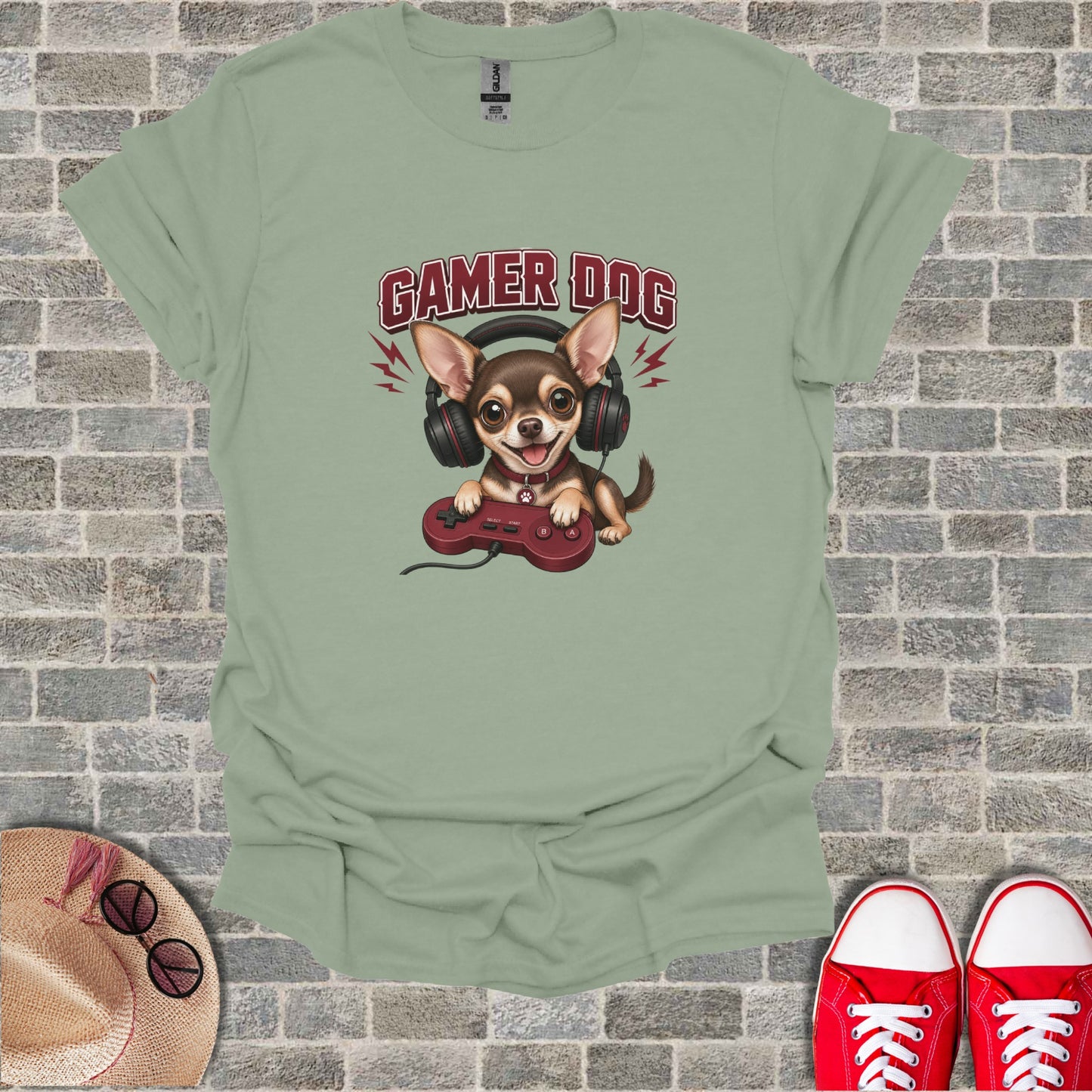 Chihuahua dog wearing headphones and holding a video game controller.