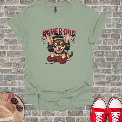 Chihuahua dog wearing headphones and holding a video game controller.
