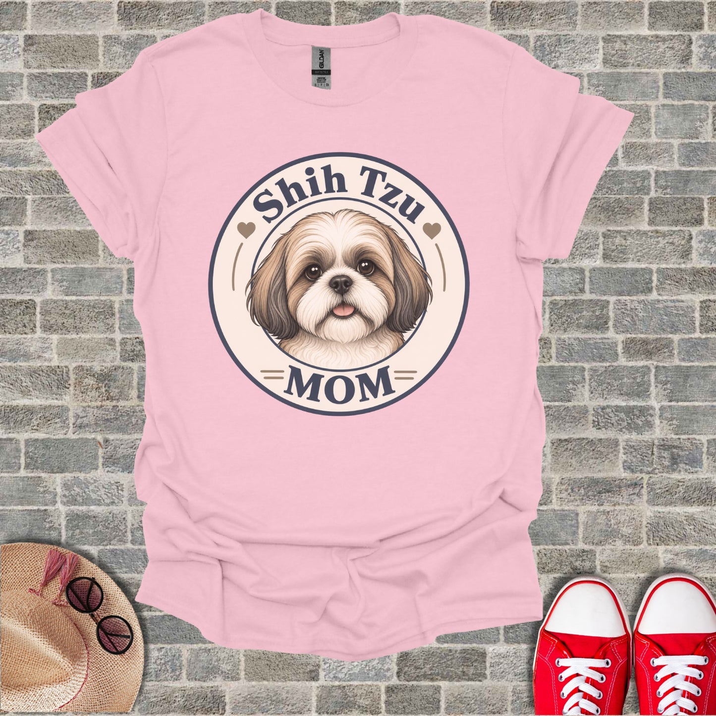 Pink t-shirt with Shih Tzu Mom graphic and dog illustration.