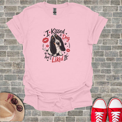 Pink t-shirt with a Basset Hound and "I Kissed a Dog and I Liked It" text.