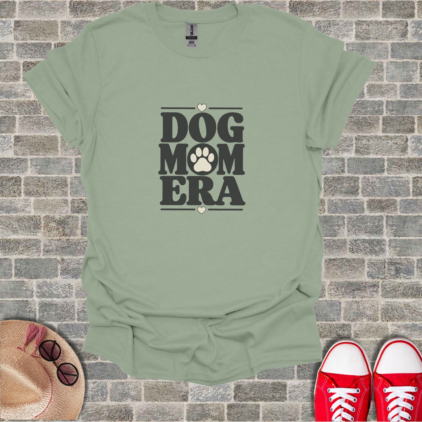 Sage t-shirt with "DOG MOM ERA" text and heart accents.