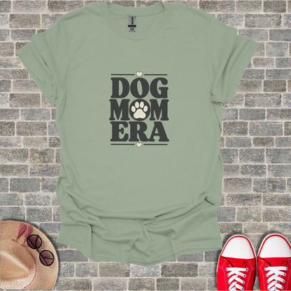 Sage t-shirt with "DOG MOM ERA" text and heart accents.
