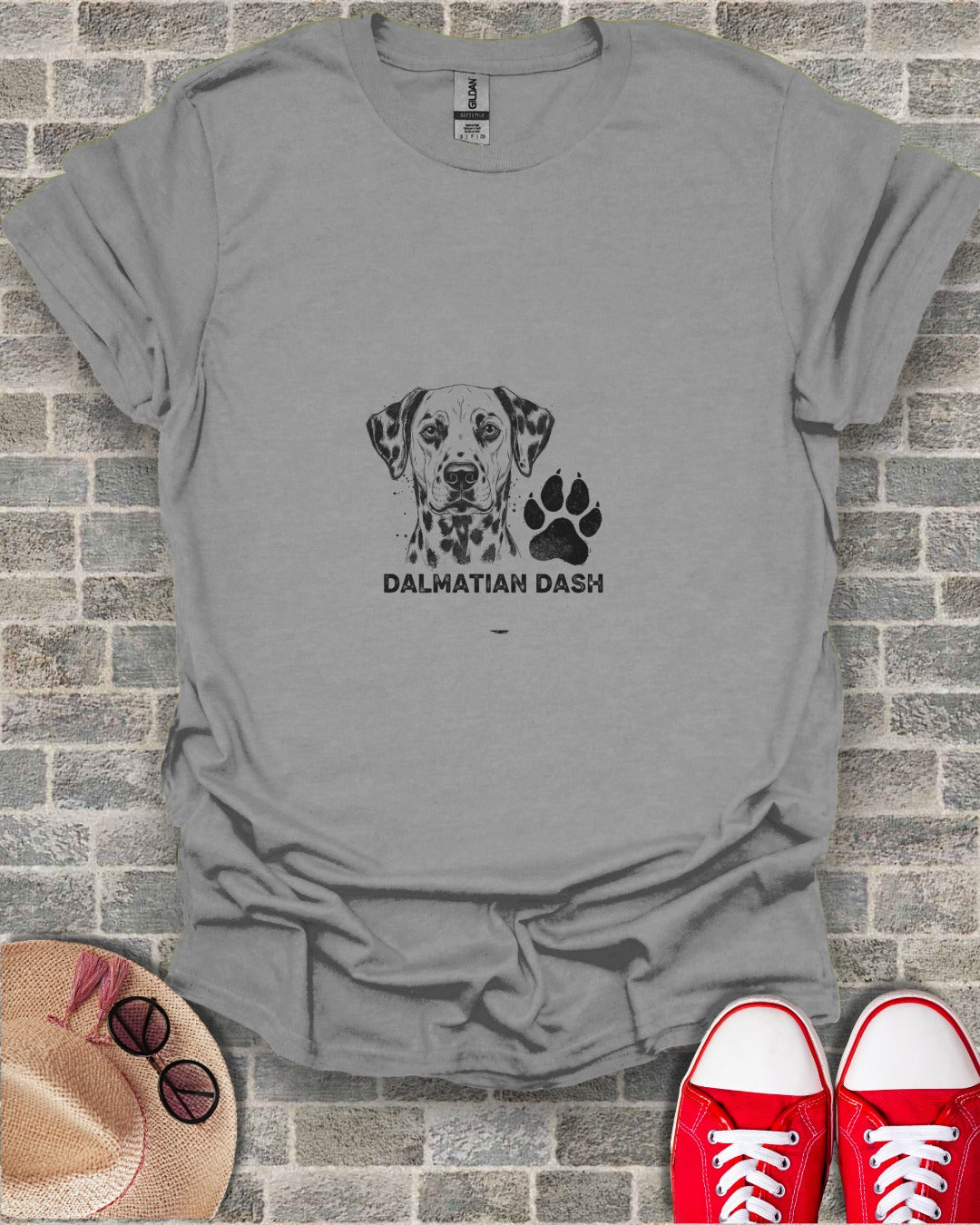 Dalmatian Dash graphic on gray t-shirt with paw print.