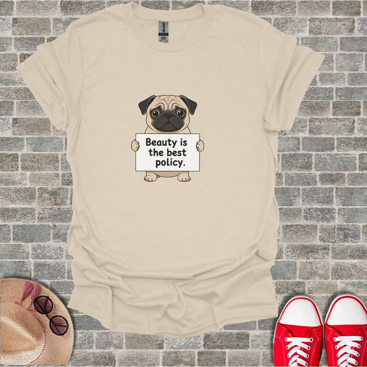 Pug holding a sign that says "Beauty is the best policy."
