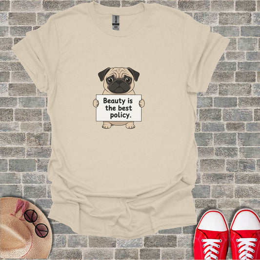 Pug holding a sign that says "Beauty is the best policy."