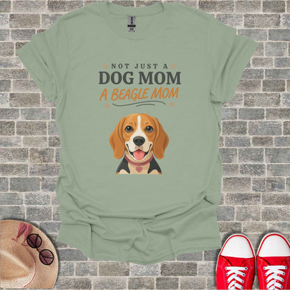 Sage t-shirt with "Not Just A Dog Mom, A Beagle Mom" text and a beagle illustration.