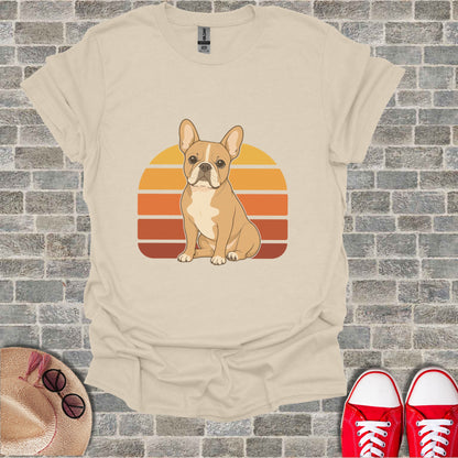 T-shirt with a tan French bulldog sitting in front of a retro sunset graphic.