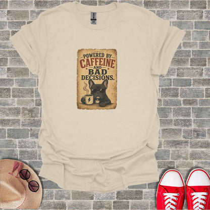 French bulldog wearing sunglasses holding coffee mug with "Powered by Caffeine and Bad Decisions" text.