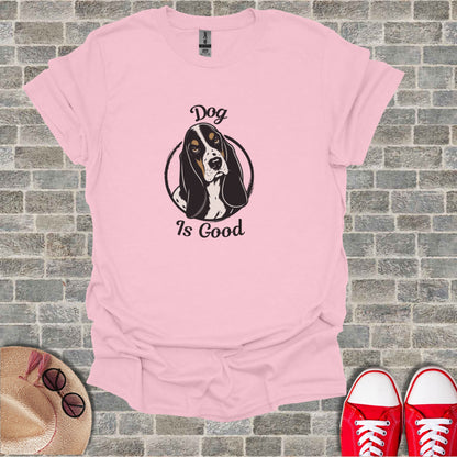 Pink t-shirt with a black and white dog illustration and "Dog Is Good" text.