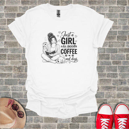 White t-shirt with "Just a girl who needs coffee and dogs" text and dog illustration.