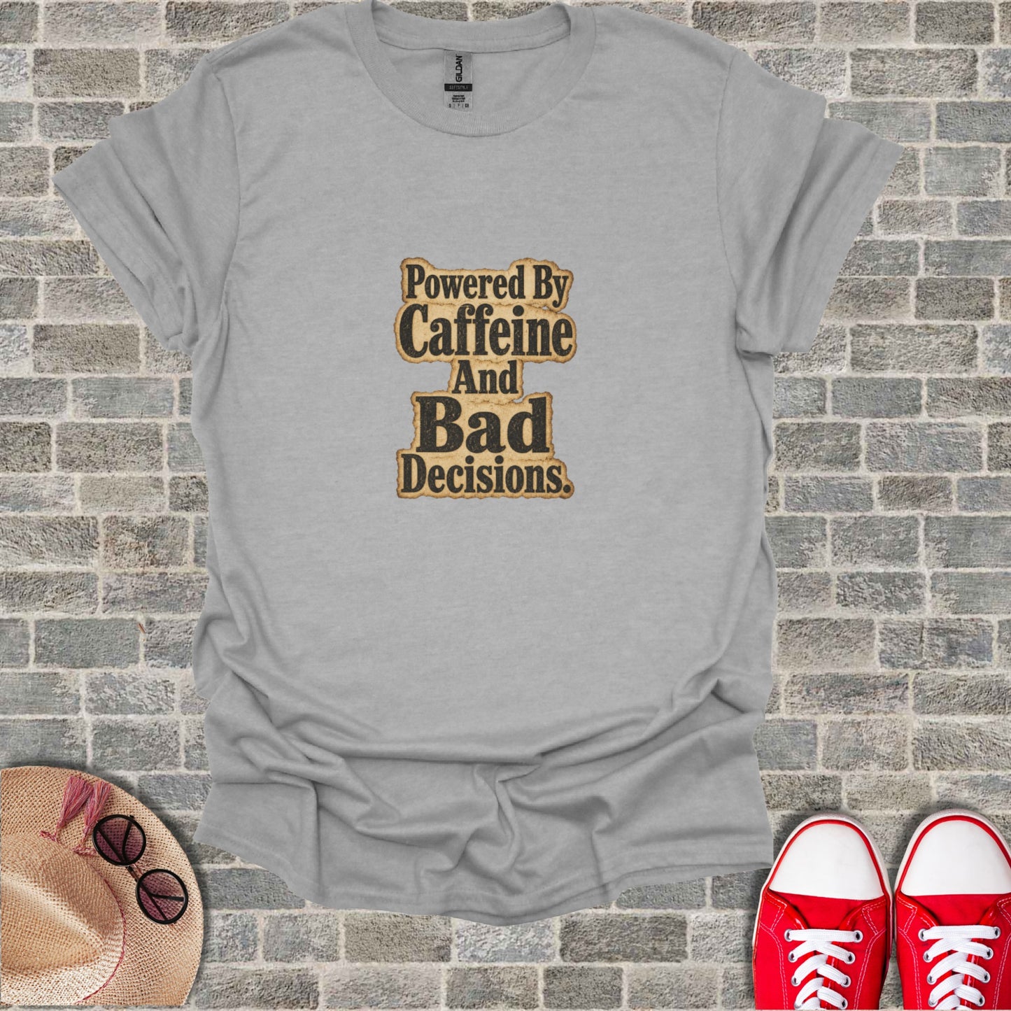Gray t-shirt with "Powered By Caffeine And Bad Decisions" text.
