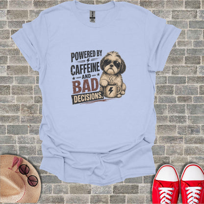 Light blue t-shirt with sunglasses-wearing dog and "POWERED BY CAFFEINE AND BAD DECISIONS" text.