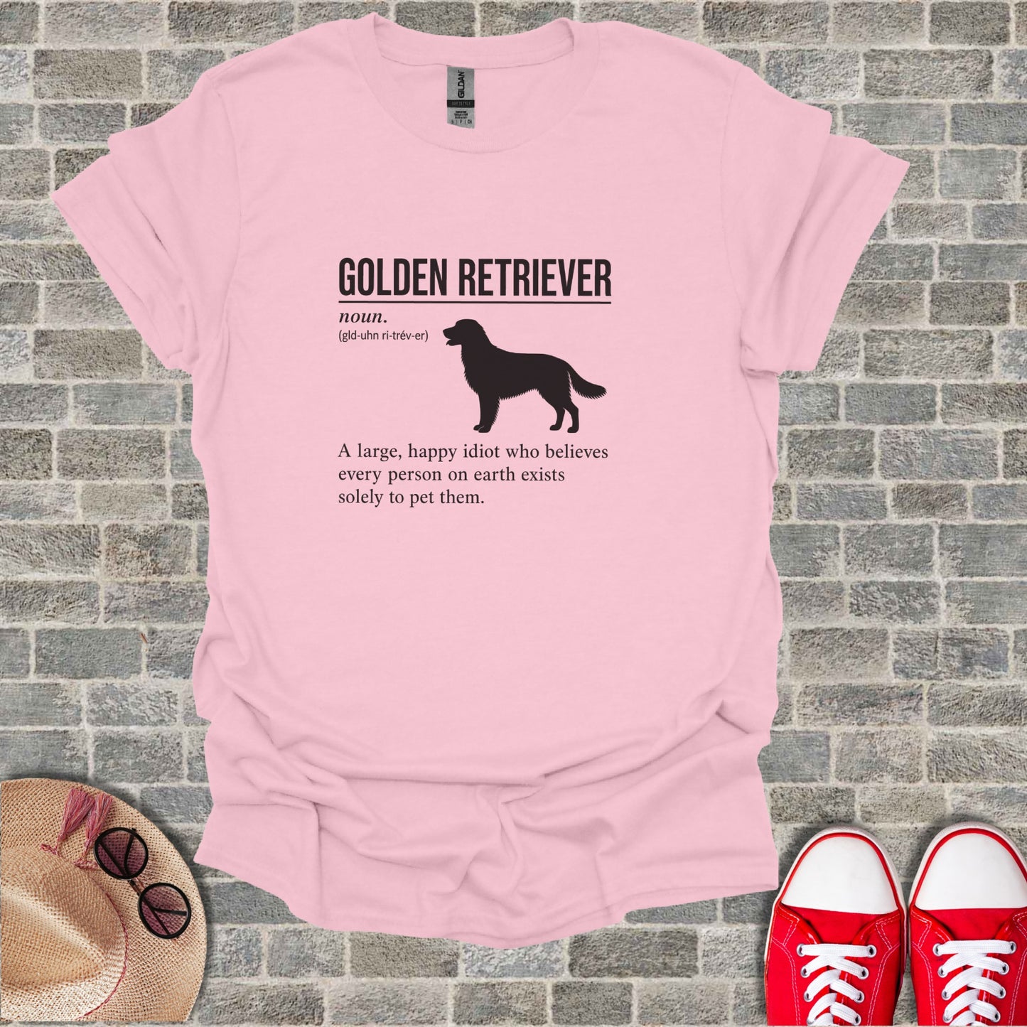 Pink t-shirt with "Golden Retriever" and definition.