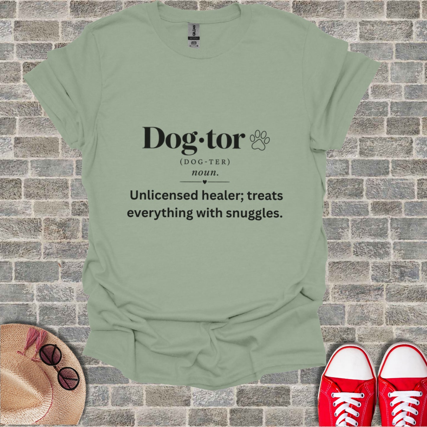 Light green t-shirt with "Dog-tor" definition text and paw print.