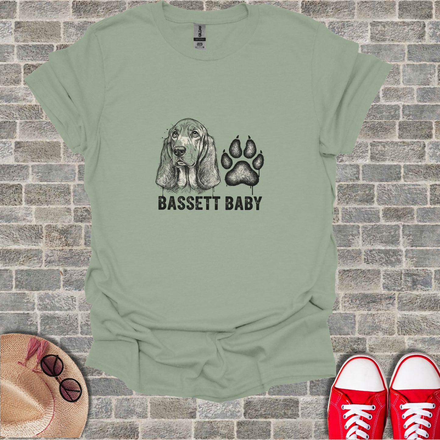 Light sage t-shirt with "BASSETT BABY" and paw print graphic.