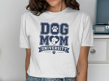 White t-shirt with "Dog Mom University" text and paw print logo.