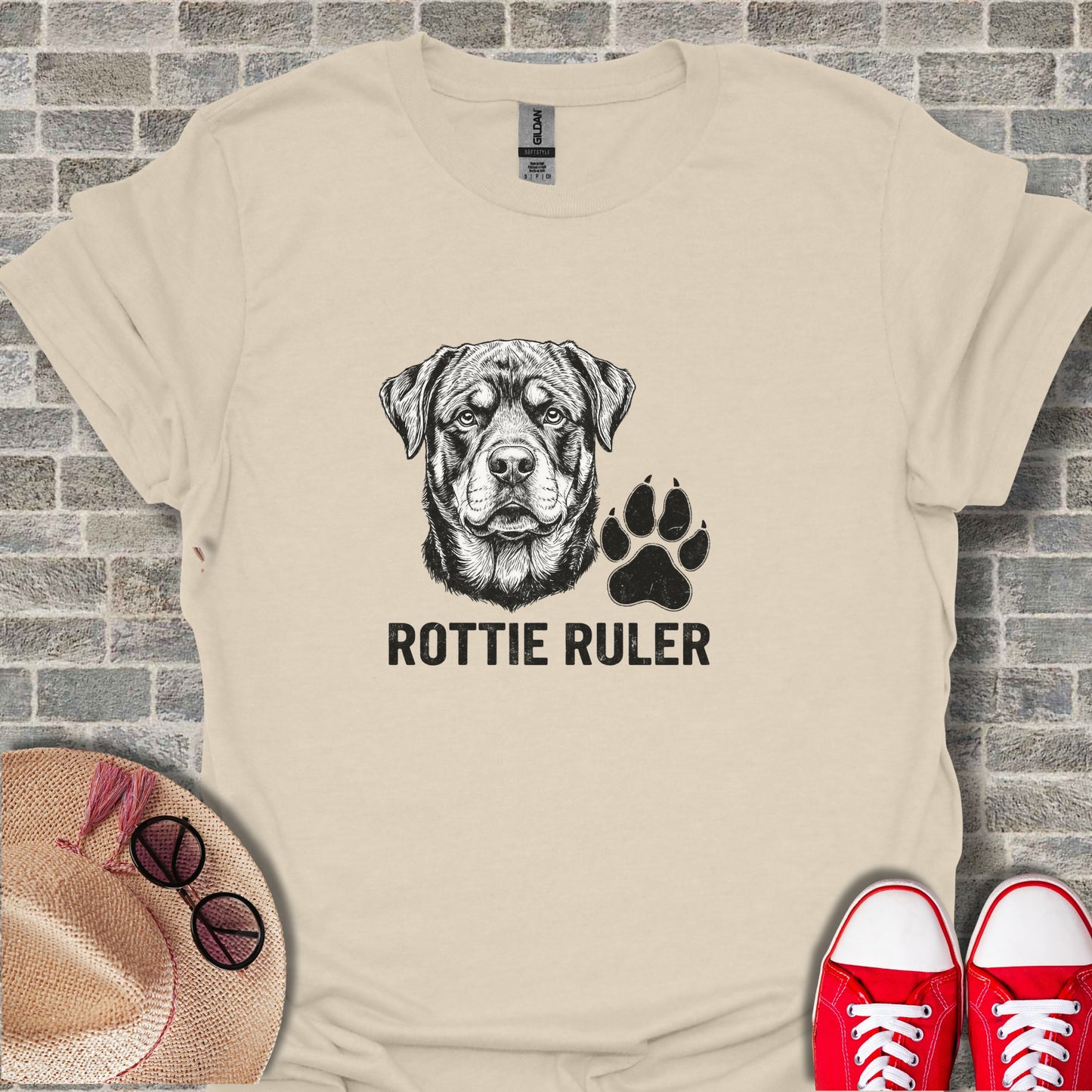 Cream t-shirt with Rottweiler head and "ROTTIE RULER" text above a paw print.