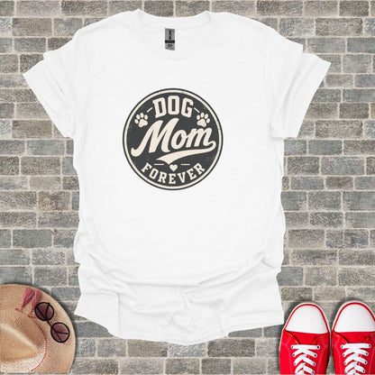 White t-shirt with "Dog Mom Forever" graphic, paw print circle.