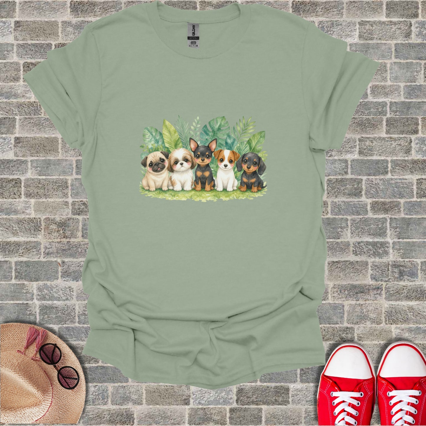 Five cute puppies sitting in a line with green leaves behind them.