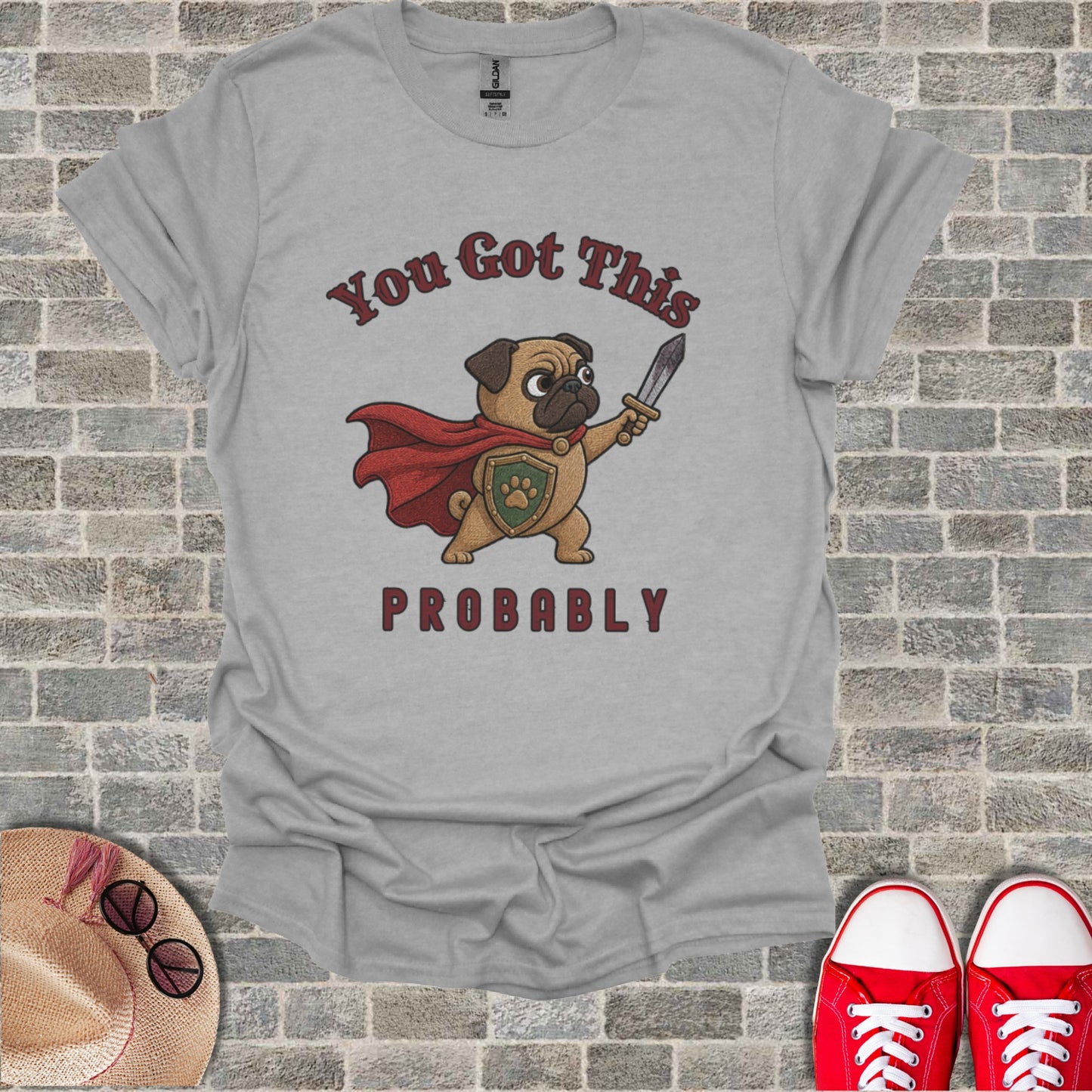 Pug wearing cape and shield, holding sword, with text "You Got This PROBABLY".