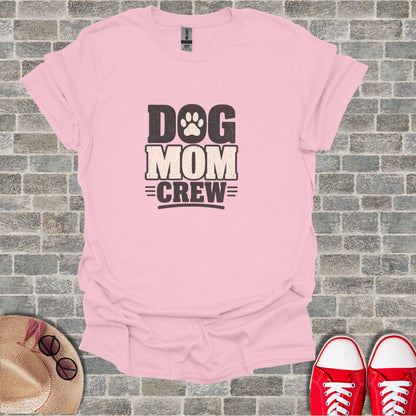 Pink t-shirt with "Dog Mom Crew" text and paw print.