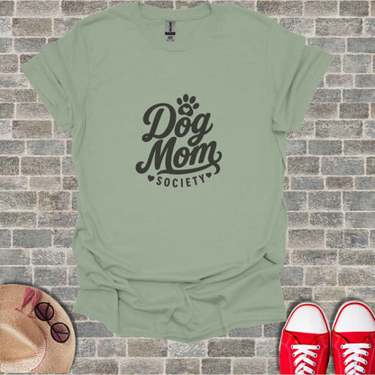 Light sage t-shirt with "Dog Mom Society" text and paw print logo.