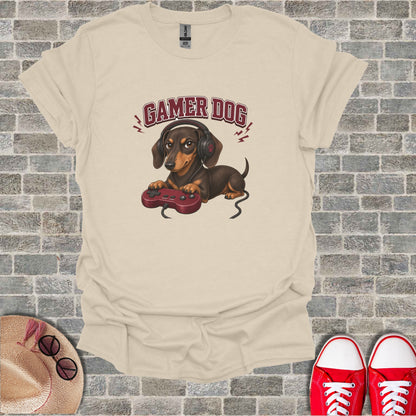 Dachshund dog wearing headphones holding a video game controller.