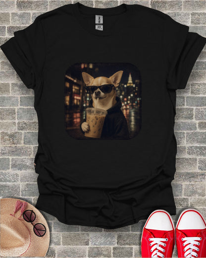 Black t-shirt with a chihuahua wearing sunglasses drinking iced coffee at night.
