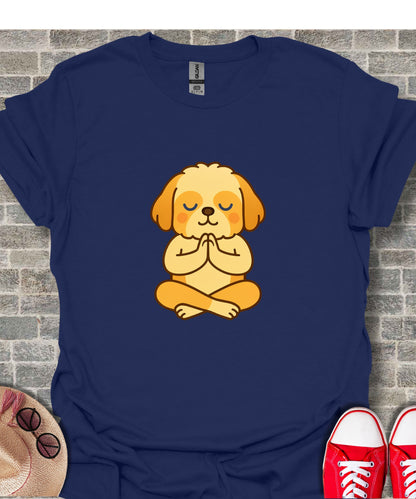 Cartoon dog meditating in lotus pose on a navy t-shirt.