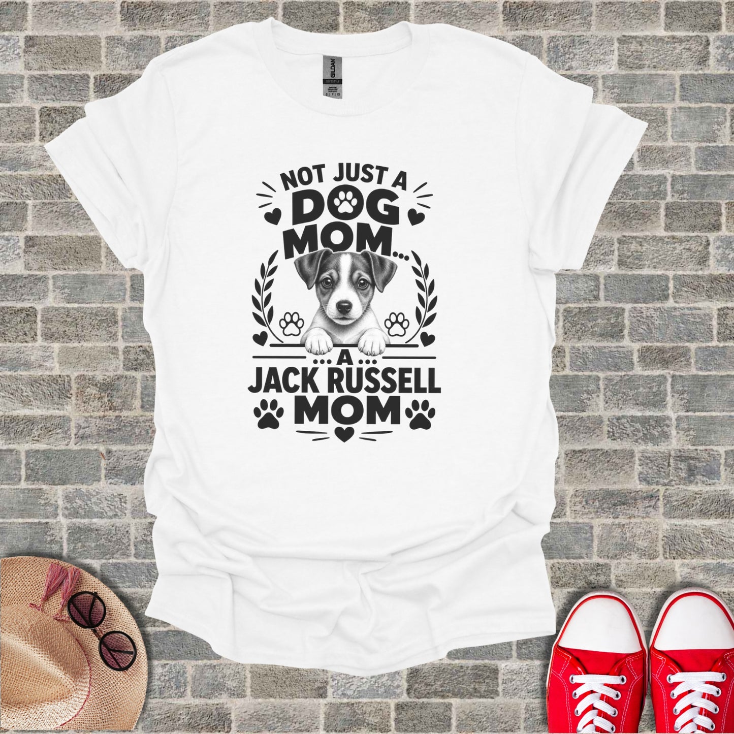 White t-shirt with text "Not Just A Dog Mom... A Jack Russell Mom" and dog graphic.
