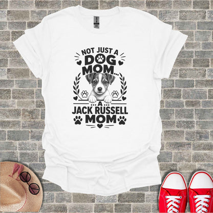 White t-shirt with text "Not Just A Dog Mom... A Jack Russell Mom" and dog graphic.