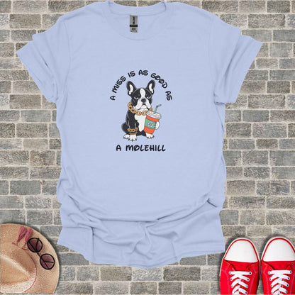Light blue t-shirt with French bulldog wearing a gold chain and holding a coffee cup.