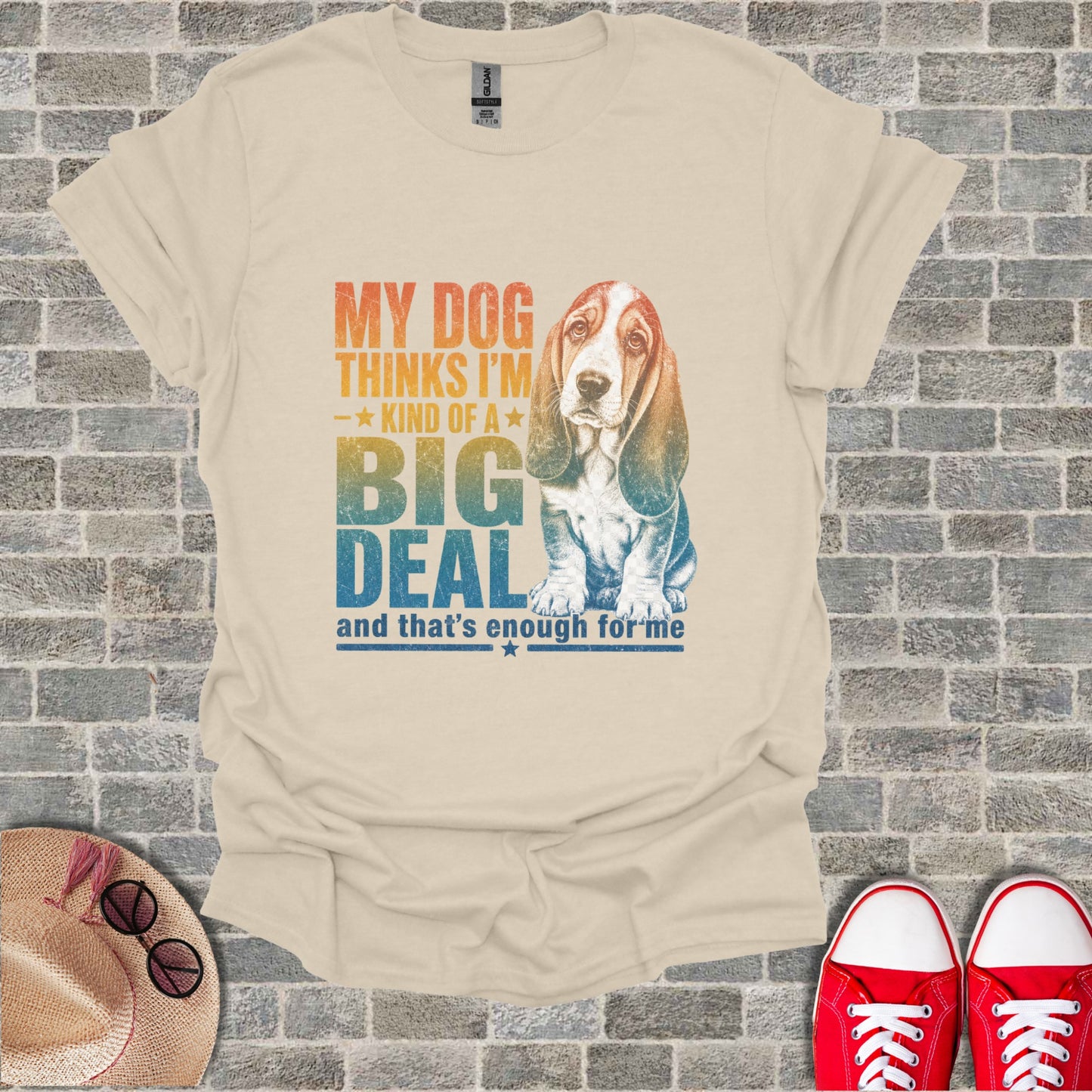 Cream t-shirt with basset hound graphic and text "My dog thinks I'm kind of a big deal".