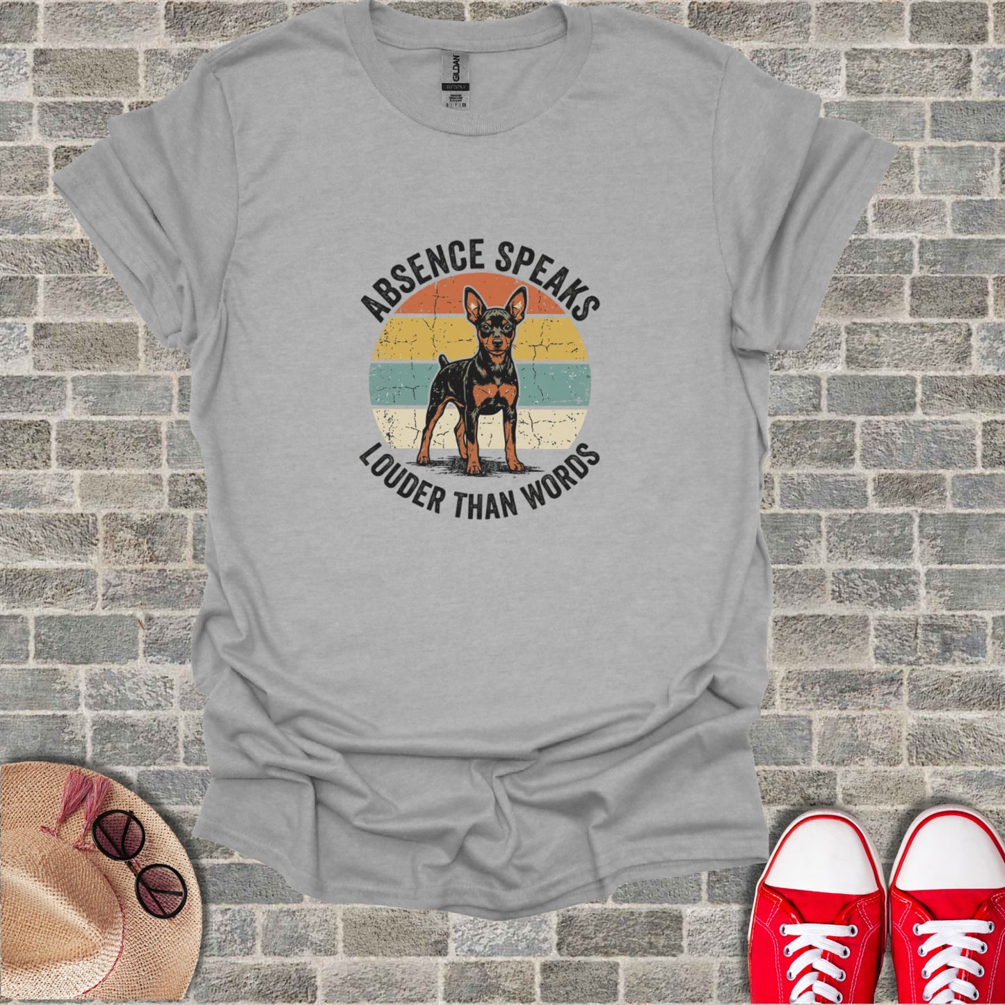 Gray t-shirt with vintage dog graphic and "Absence Speaks Louder Than Words" text.