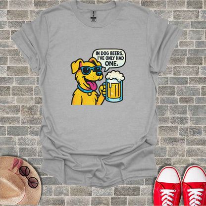 Cartoon dog wearing sunglasses holding a beer, text reads "In dog beers, I've only had one."