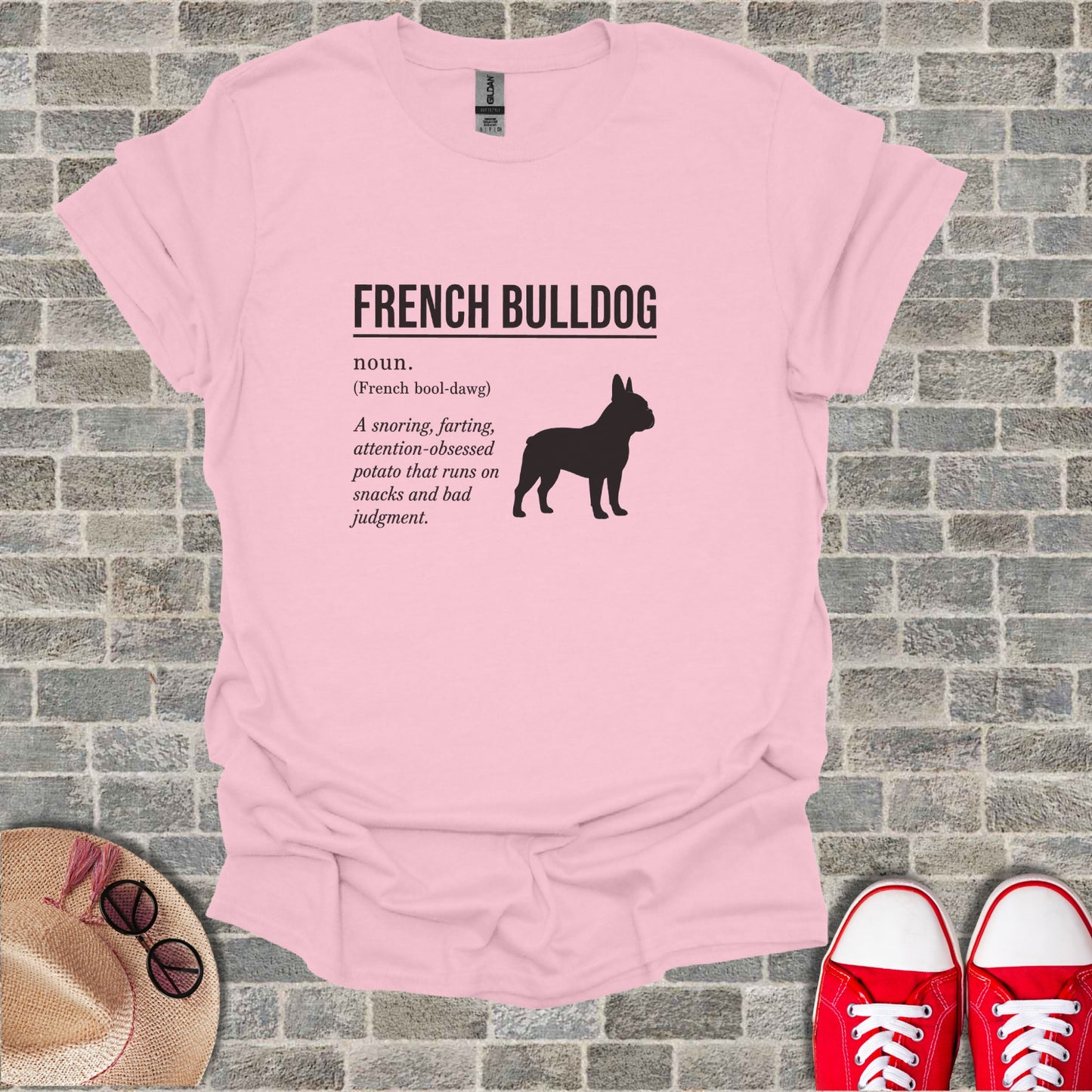 Pink t-shirt with "French Bulldog noun. A snoring, farting, attention-obsessed potato" text.