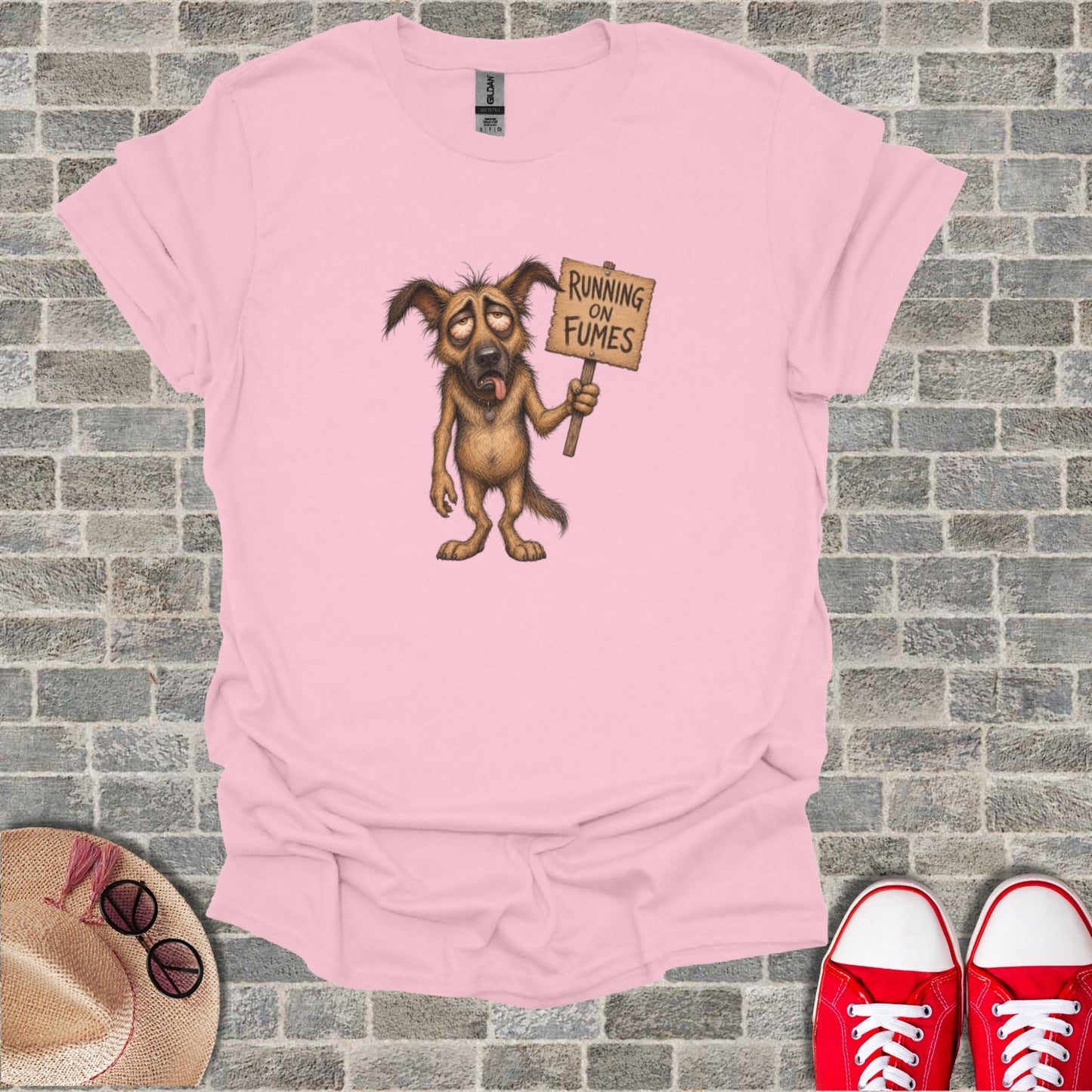 T-shirt with cartoon dog holding "RUNNING ON FUMES" sign.