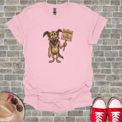 T-shirt with cartoon dog holding "RUNNING ON FUMES" sign.