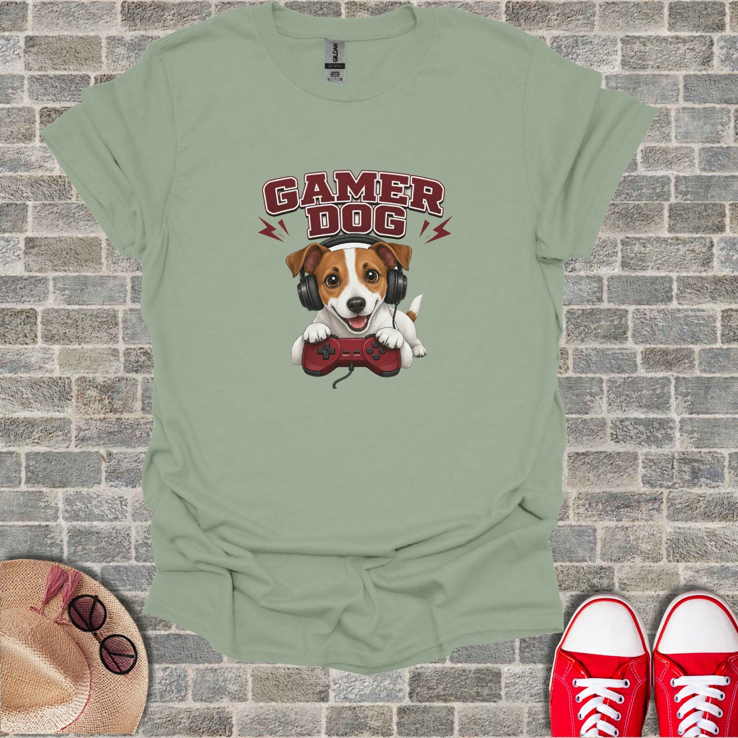 Dog wearing headphones and holding a video game controller.