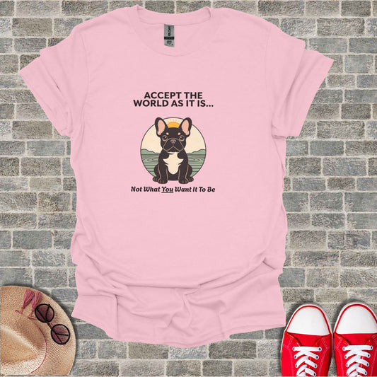Pink t-shirt with French bulldog graphic and text "Accept the World As It Is... Not What You Want It To Be".