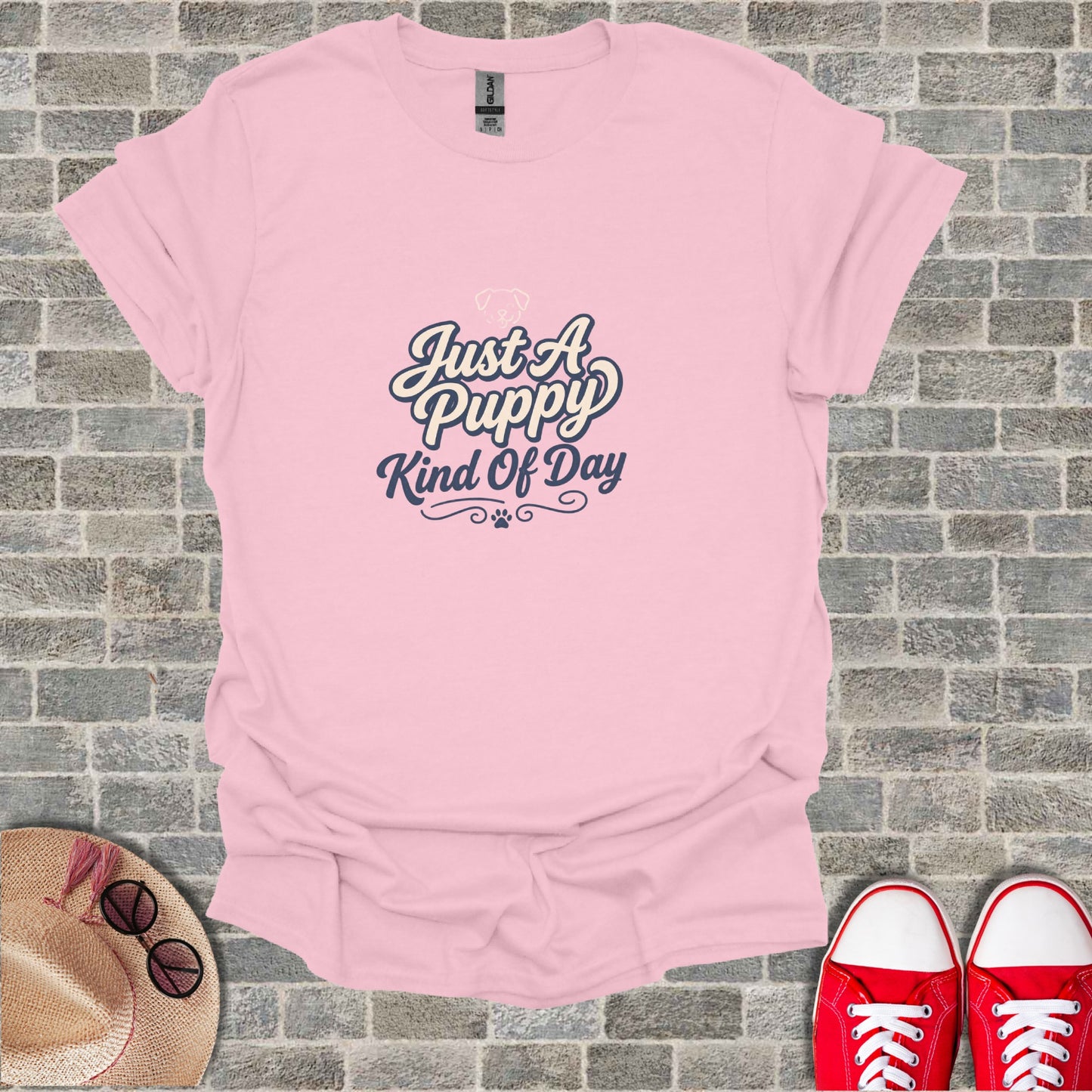 Pink t-shirt with "Just A Puppy Kind of Day" text.