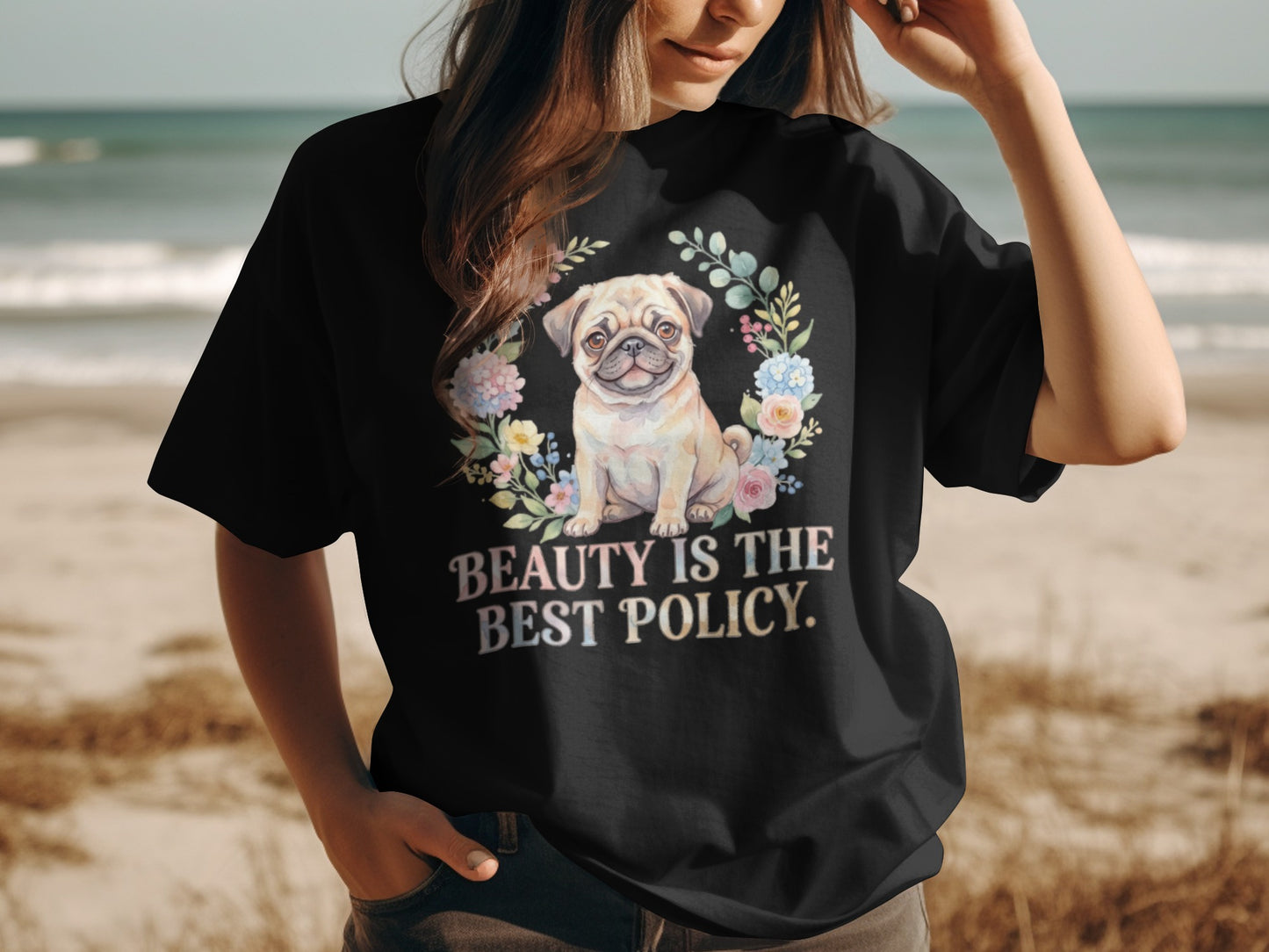 Black t-shirt with pug and floral wreath, text reads "Beauty is the best policy."